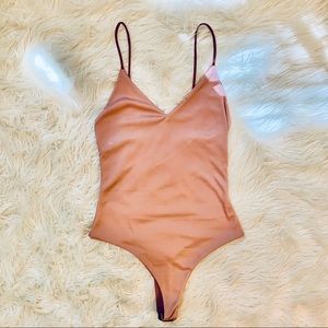 Pink Reversible Bodysuit
